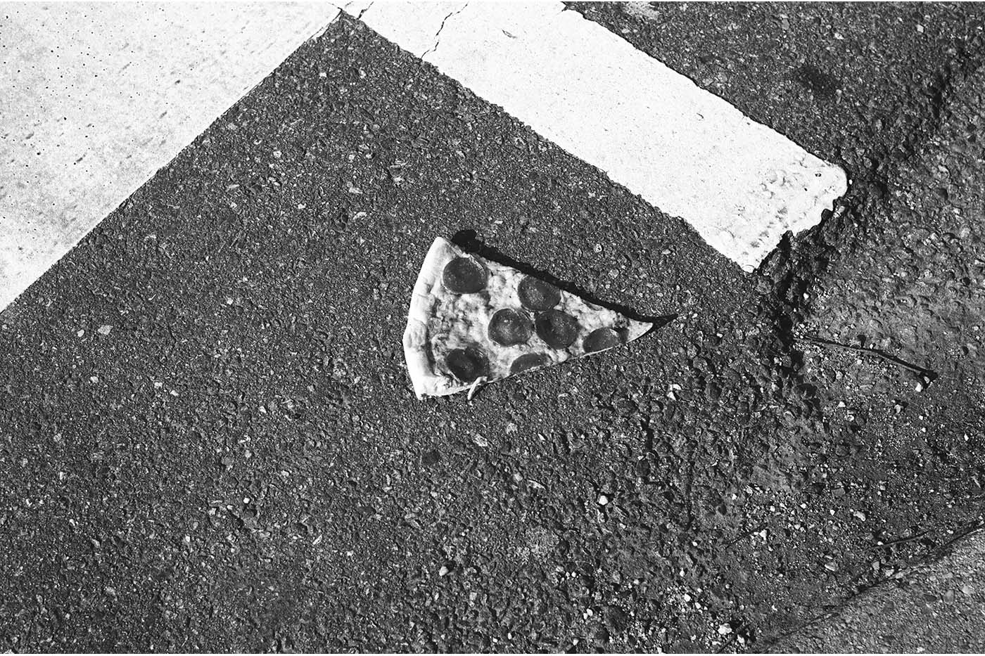 Artistic pizza on the ground