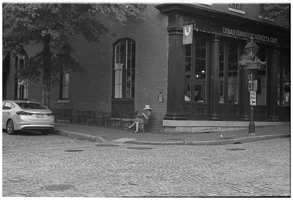 Elegant woman sitting outside a café